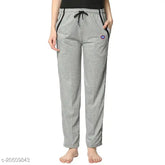 Grey cotton blend solid straight-fit trousers for women, size 32 (waist 30in, length 38in), on a clothing rack